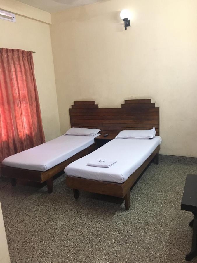 Nellimoottil Guest House Kottayam Quarto foto