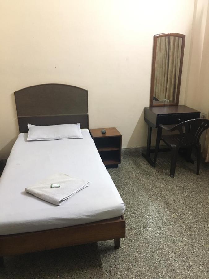 Nellimoottil Guest House Kottayam Quarto foto